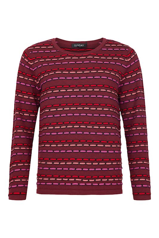 Stickad tröja i fint mönster